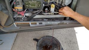 Draining engine oil